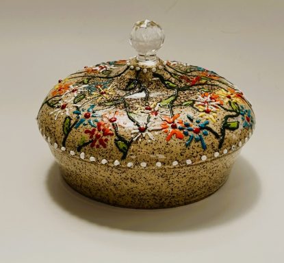 Speckled clay base lidded vessel. Hand painted exterior. White matt underglaze glaze interior. H-9cm x W-45cm.